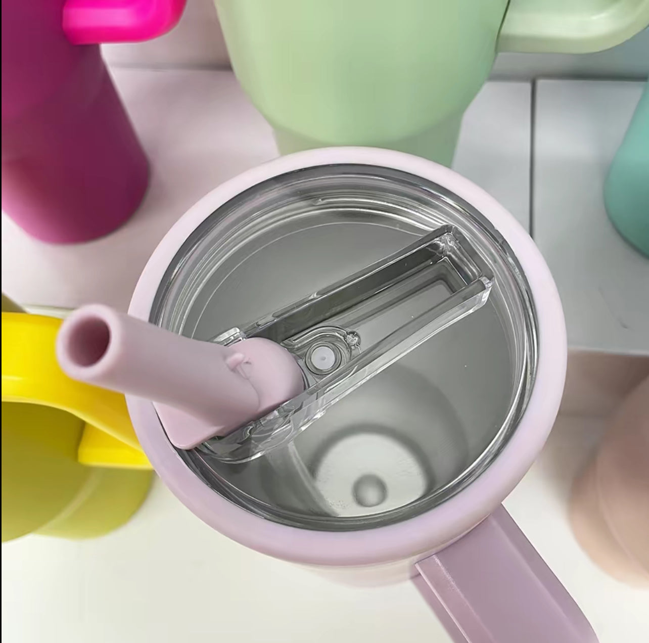 40oz. Colored stainless steel flip straw tumbler with handle